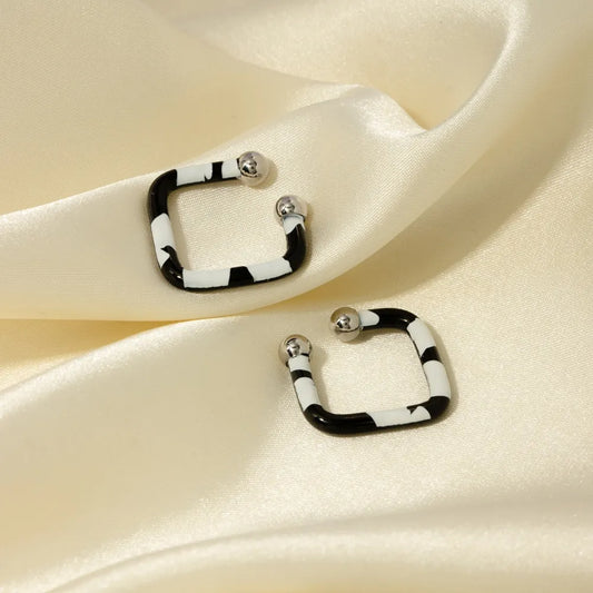 Molten Moon Cuff Earrings in polished multicolor stainless steel